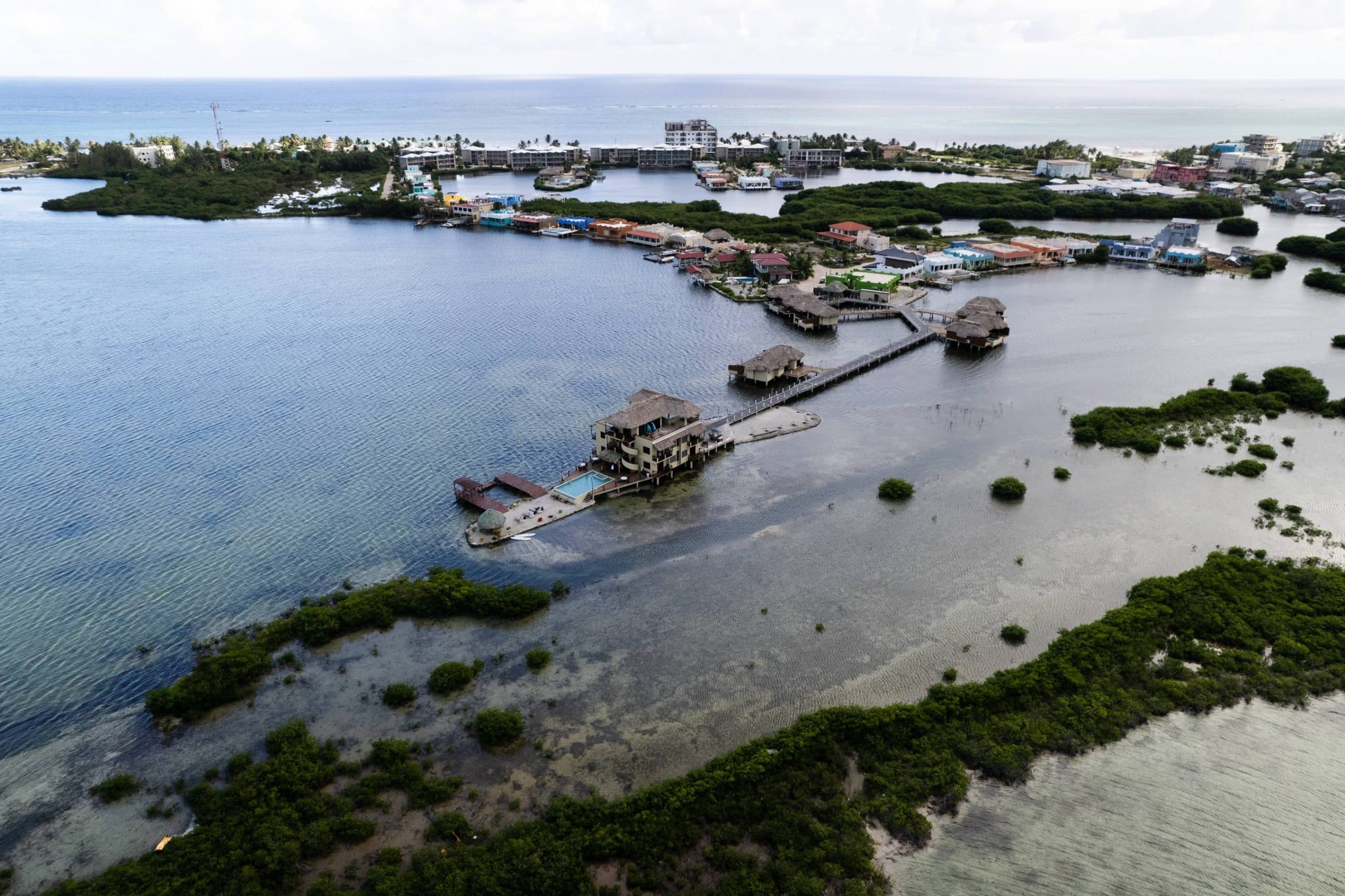 Aerial view of Lina Point Resort overwater cabanas in Belize